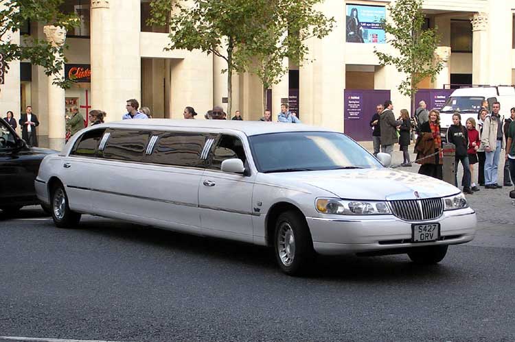 White stretch limousine